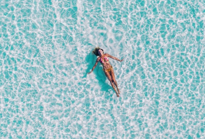 Woman lying in pool