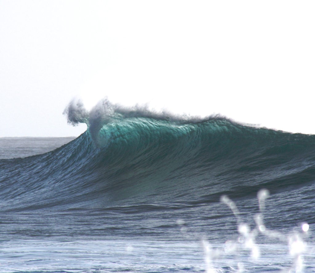 Breaking wave on beach