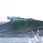 Breaking wave on beach