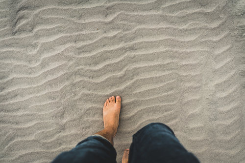 Feet on Sandy Beach
