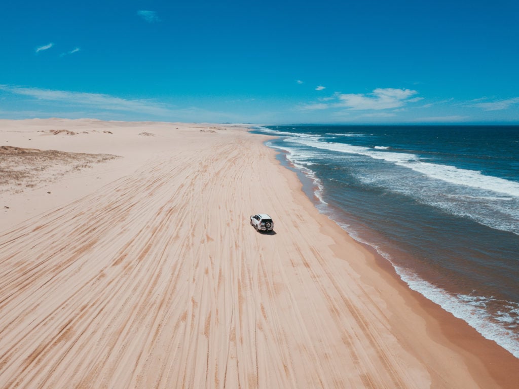 Driving on sandy beach