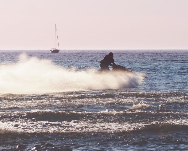 man jetskiing in noosa