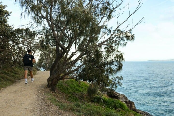 man walking along trail in noosa