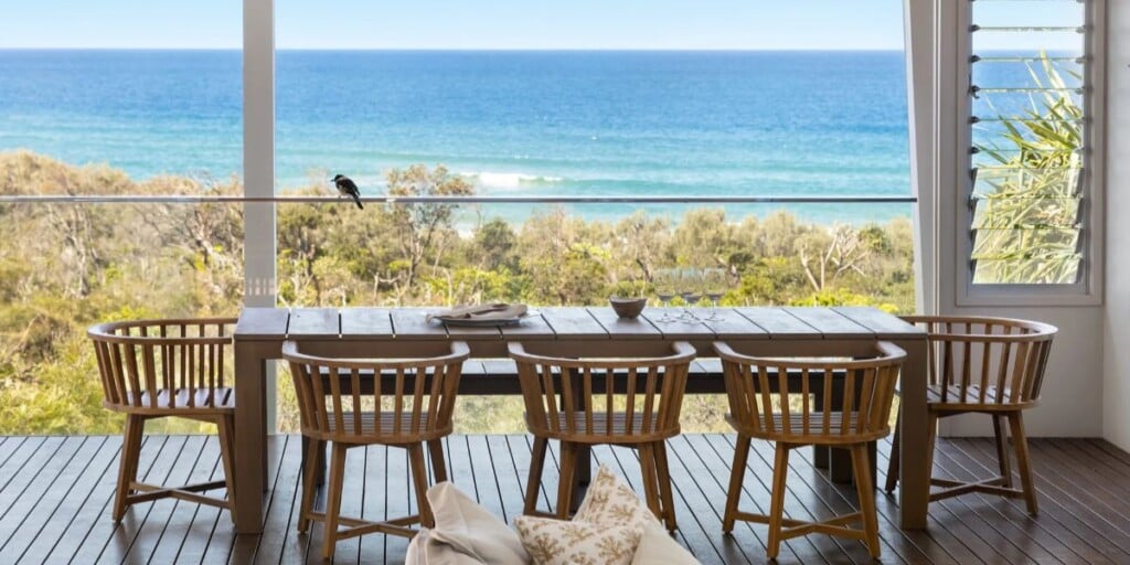 Private balcony with ocean view at a Noosa holiday rental