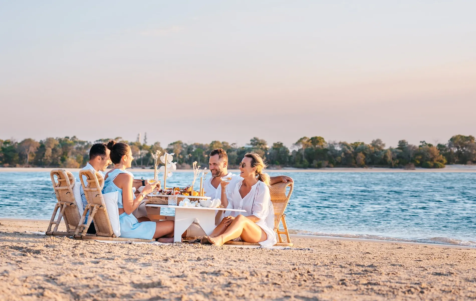 people on the beach in noosa winter