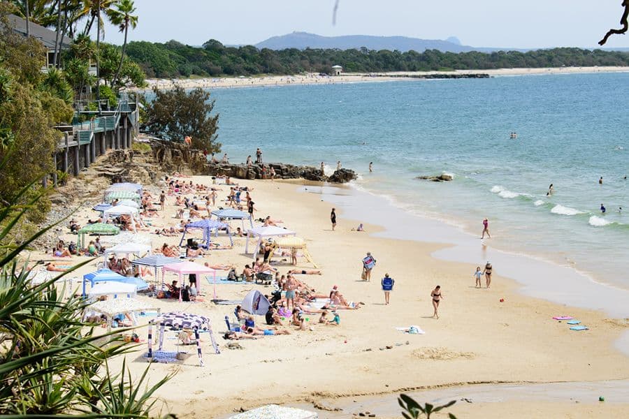 people on the beach in little cove